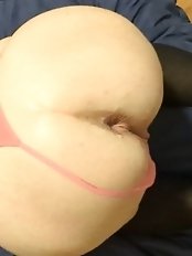 A sexy older woman gives a blow job.