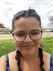 A woman with an extra layer of fat is masturbating.