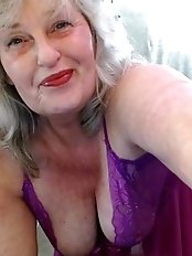 Chubby wife outdoors in the garden.