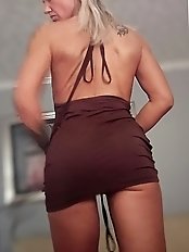 Pretty blonde wife showing off her slim summer body