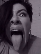 A mature woman performs oral sex and holds semen in her mouth