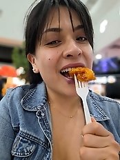 A mature woman is having fun with a young boy in the bedroom