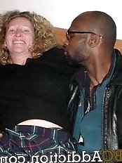 Hot MILF Stella in a white dress and black pantyhose showcasing her seductive charm