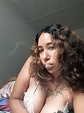 Skinny MILF is fingering her pussy and showing her boobs