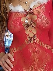 A hot chick is posing naked for a photo shoot in the studio