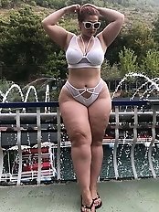 Flawless older girl is taking off her dress