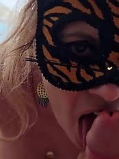 A mature amateur MILF with large breasts and a panda-themed costume