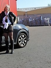 An amazing mature woman is pleasuring herself with her fingers