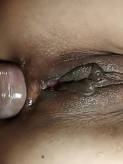 Attractive middle-aged woman engages in sexual activity with her partner