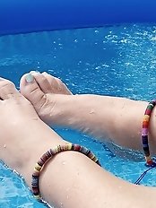 Mature woman with pierced genitalia in a seductive image collection