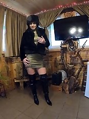 Giving a deep blow job while dressed in a fur coat and shiny boots 204.